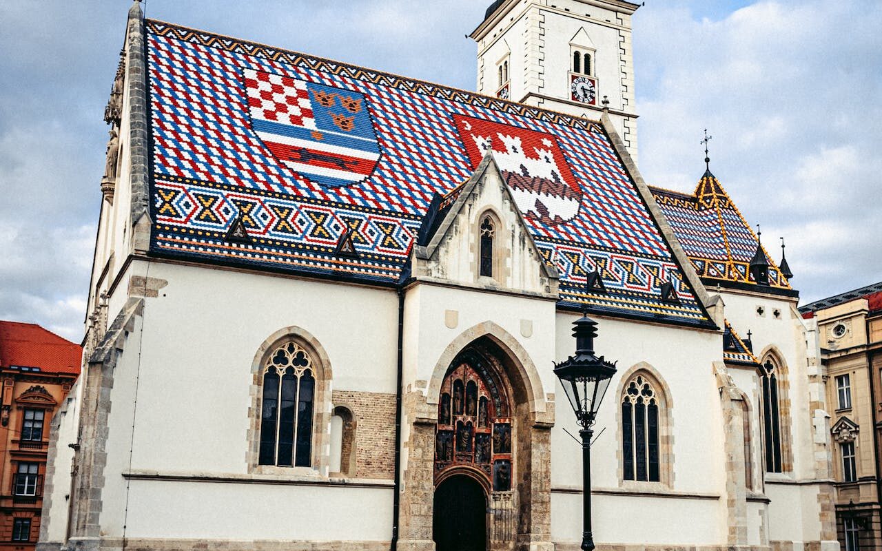 image source Photo by Jonas Togo: https://www.pexels.com/photo/st-marks-church-in-zagreb-18429115/