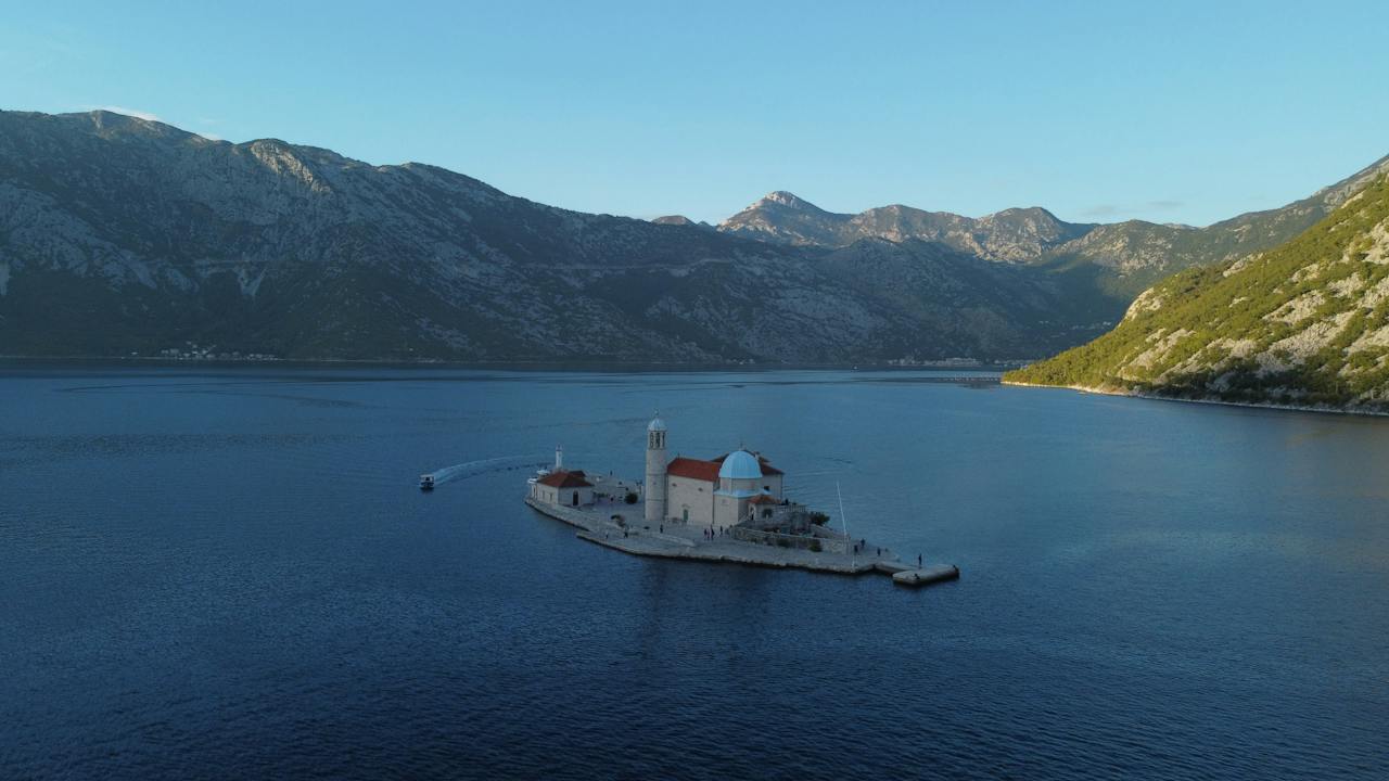 image source Photo by Julien Goettelmann: https://www.pexels.com/photo/lady-of-the-rocks-in-kotor-bay-18924398/