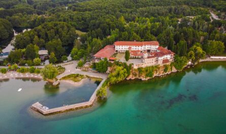 image source Photo by Micko Damnjanovski: https://www.pexels.com/photo/aerial-view-of-the-monastery-of-saint-naum-at-ohrid-lake-9521496/