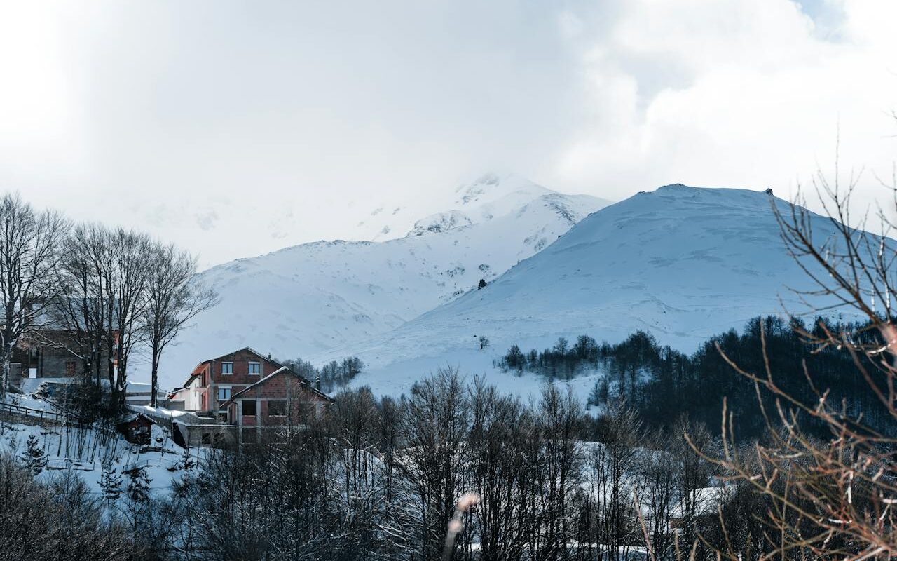 image source Photo by Ardit Mbrati: https://www.pexels.com/photo/a-snowy-mountain-range-with-a-house-in-the-foreground-16050560/