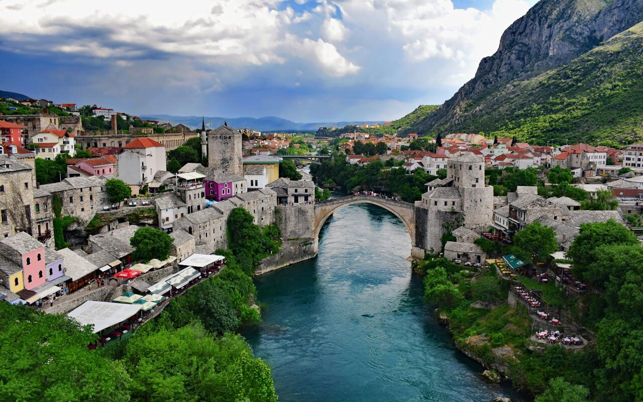 image source Photo by Jocelyn Erskine-Kellie: https://www.pexels.com/photo/aerial-view-of-the-arch-stari-most-or-old-bridge-crossing-the-neretva-river-in-bosnia-and-herzegovina-8395586/
