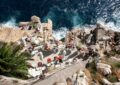 image source Photo by Martin Uradnicek: https://www.pexels.com/photo/tourists-on-the-terraces-of-the-buza-bar-on-the-seaside-cliff-of-dubrovnik-12383597/